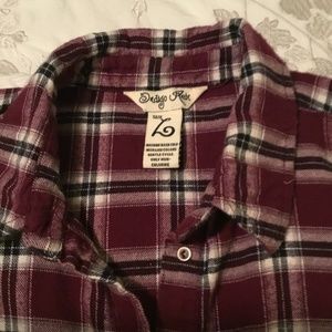Woman’s plaid cold shoulder top